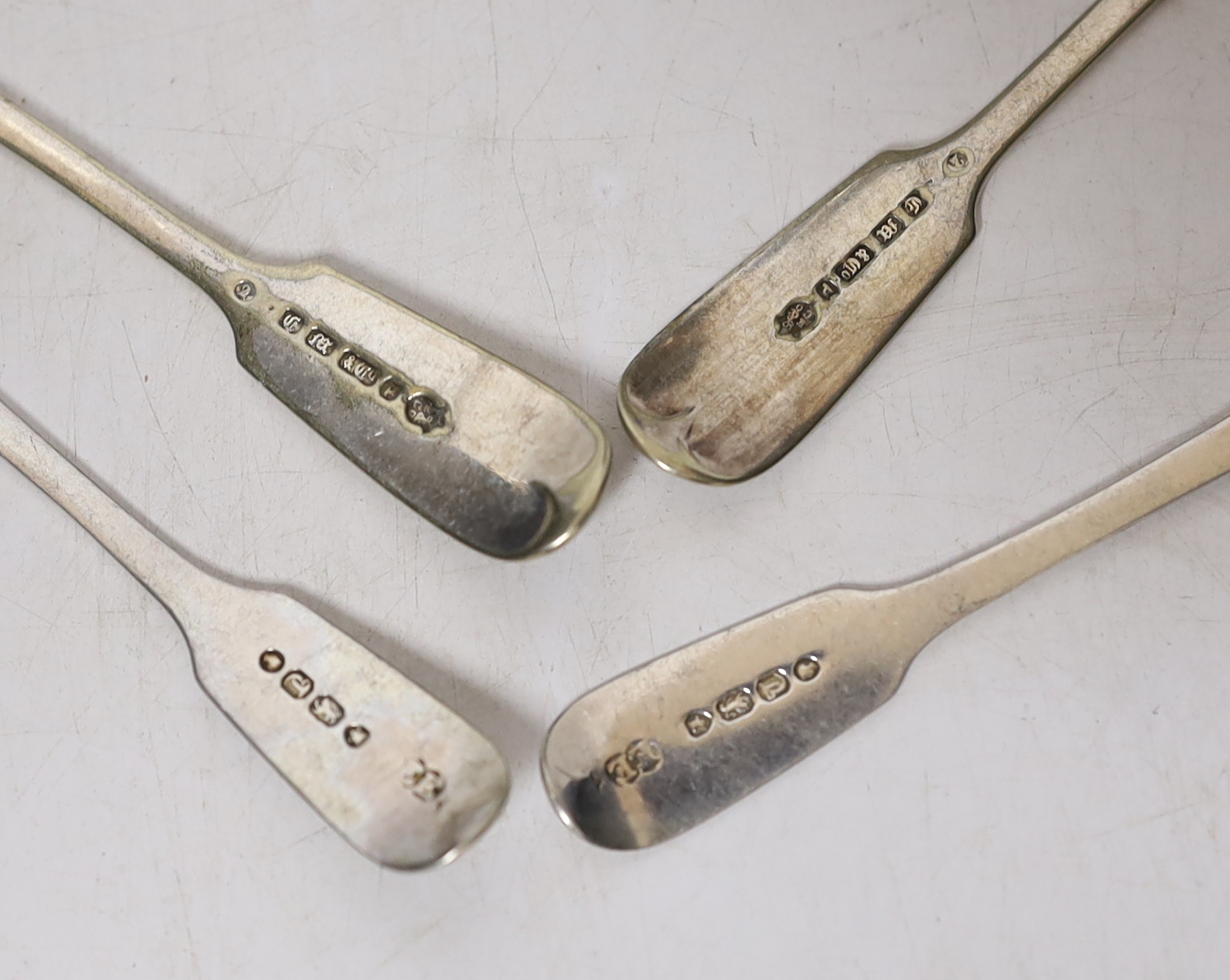 Four silver mustard ladles, including two 19th century, two plated ladles and an Edwardian silver mounted glass salts jar, London, 1905, 94mm.